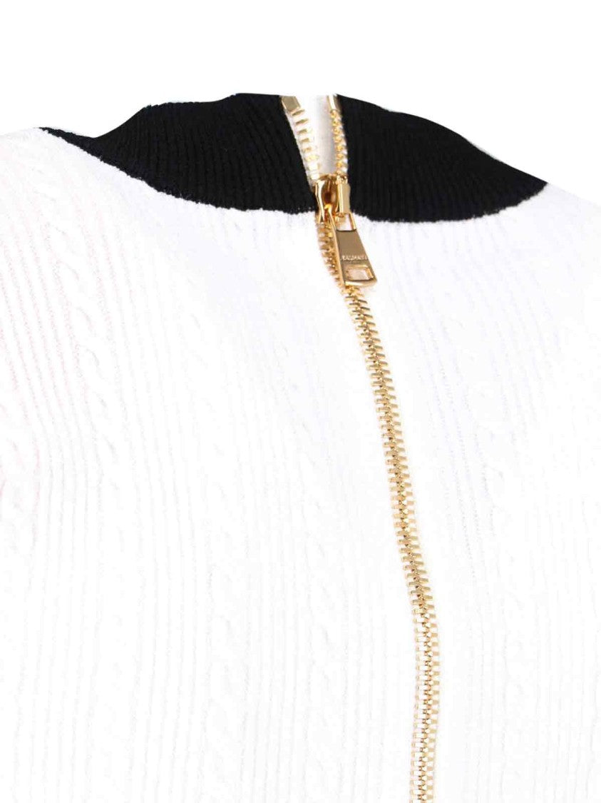 Balmain Fitted Black Dress With Ribbed Texture And Gold Accents