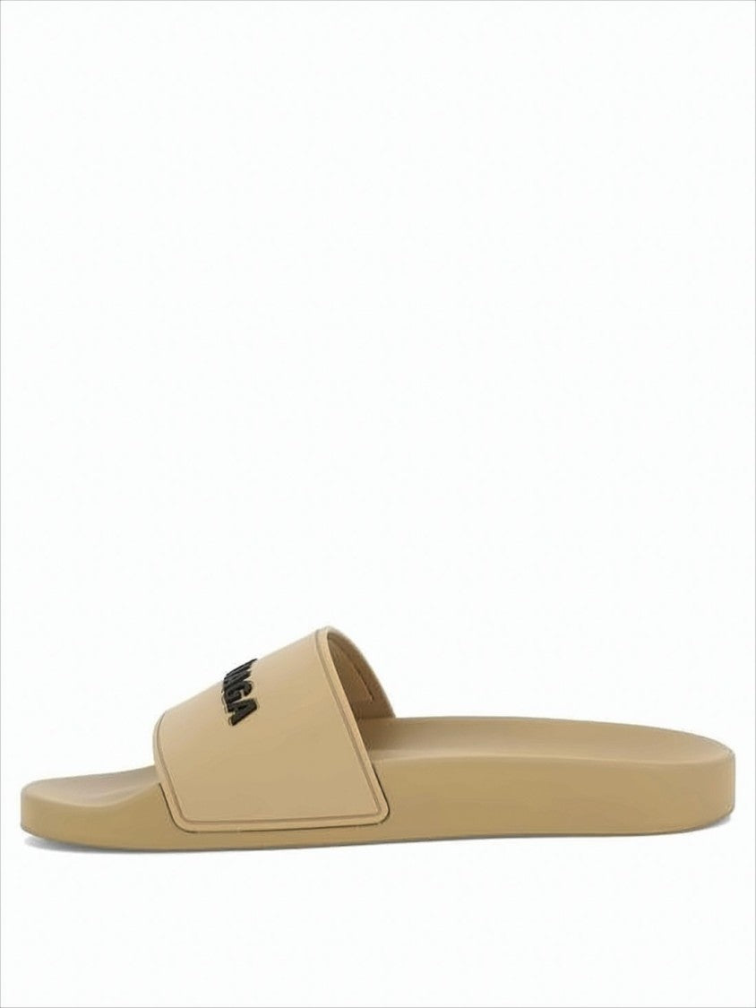 Balenciaga Rubber Slip-On Mules With Textured Sole And Raised Lettering