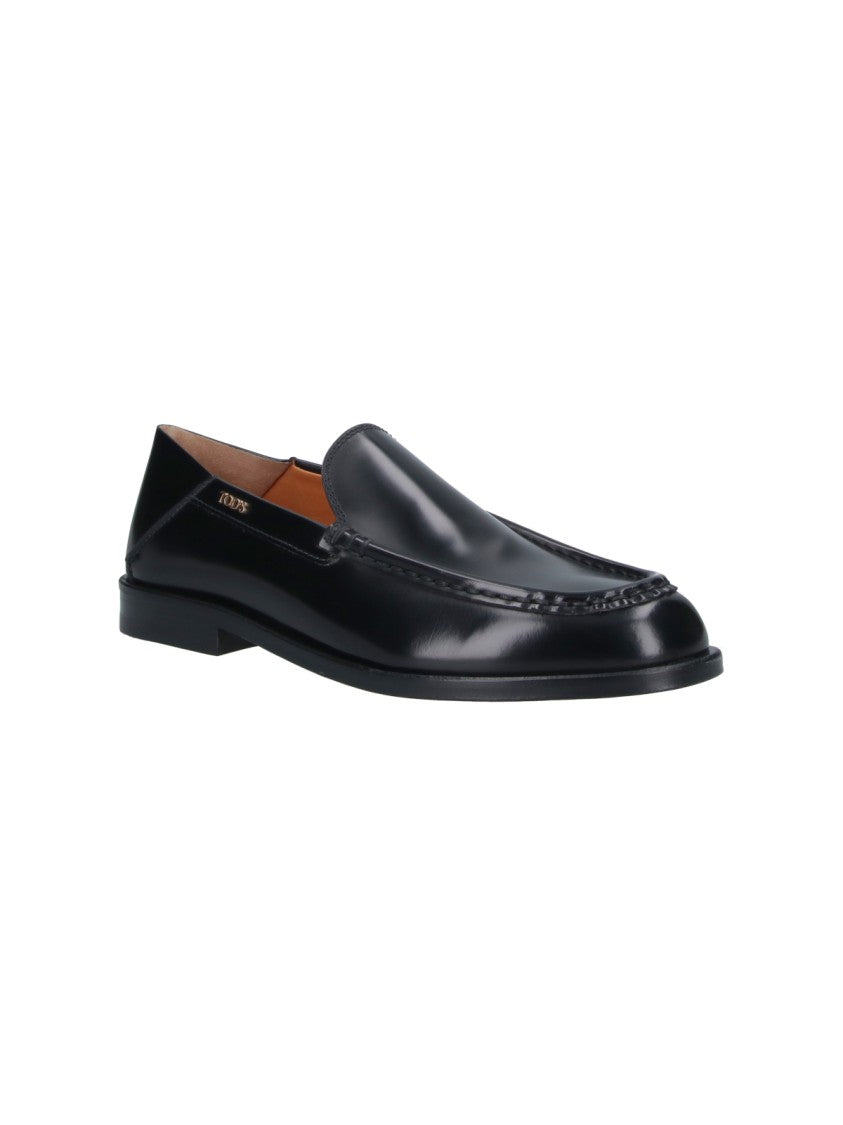 Tod's Black Rounded Toe Gold Logo Moccasins