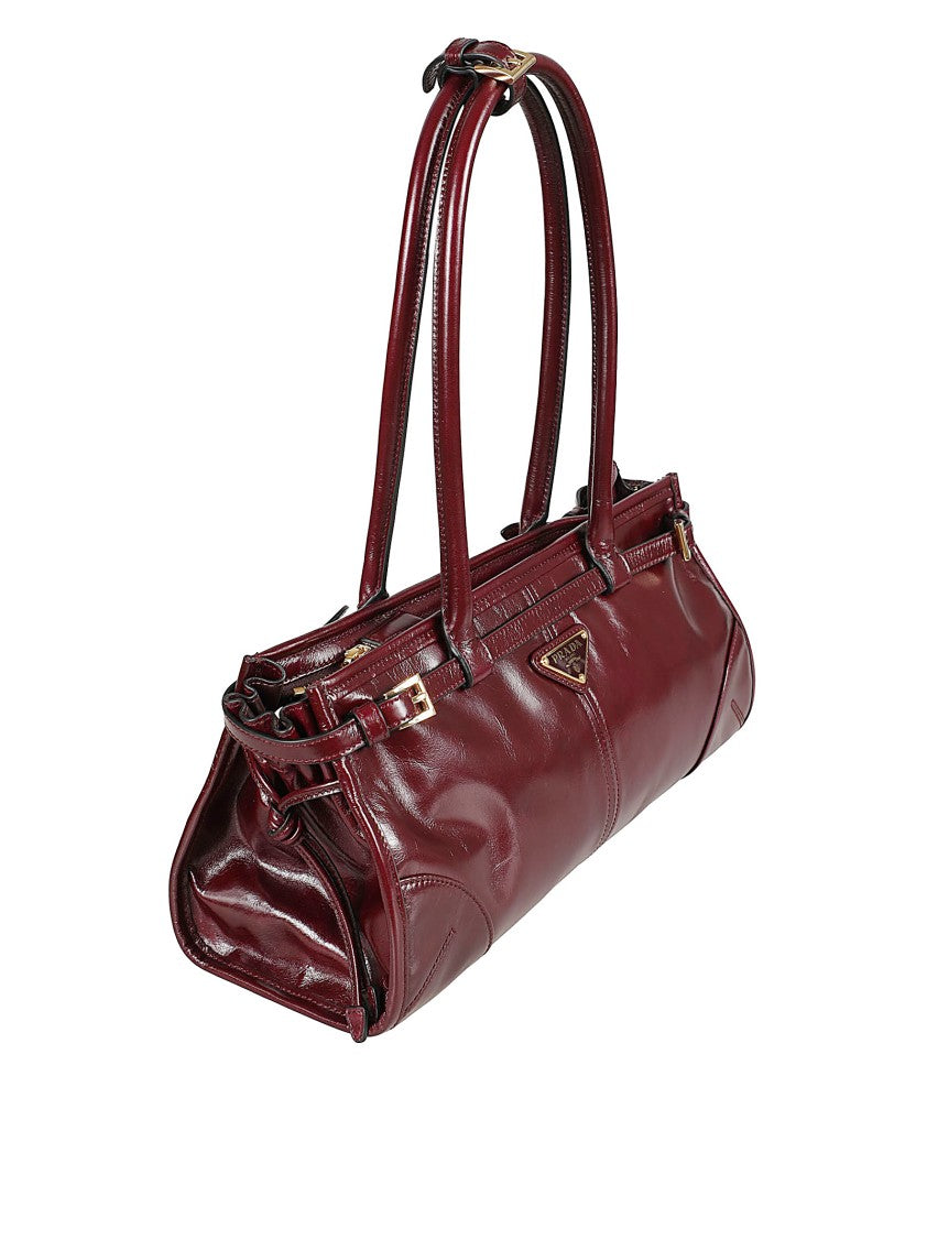 Prada Burgundy Glossy Leather Handbag With Geometric Design