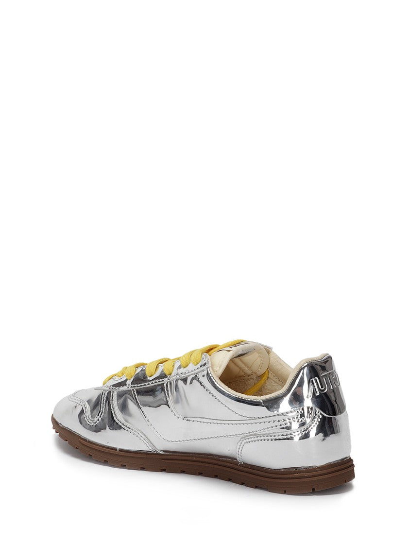 Autry Front Lace Sneakers In Bright Yellow And Shiny Silver
