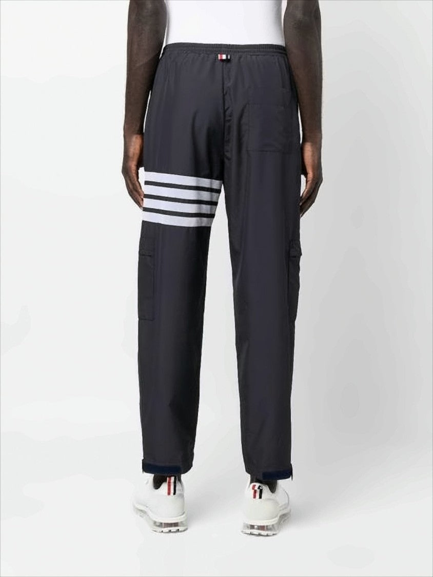 Thom Browne Sleek Black Training Jogger Pants With Distinctive Stripes