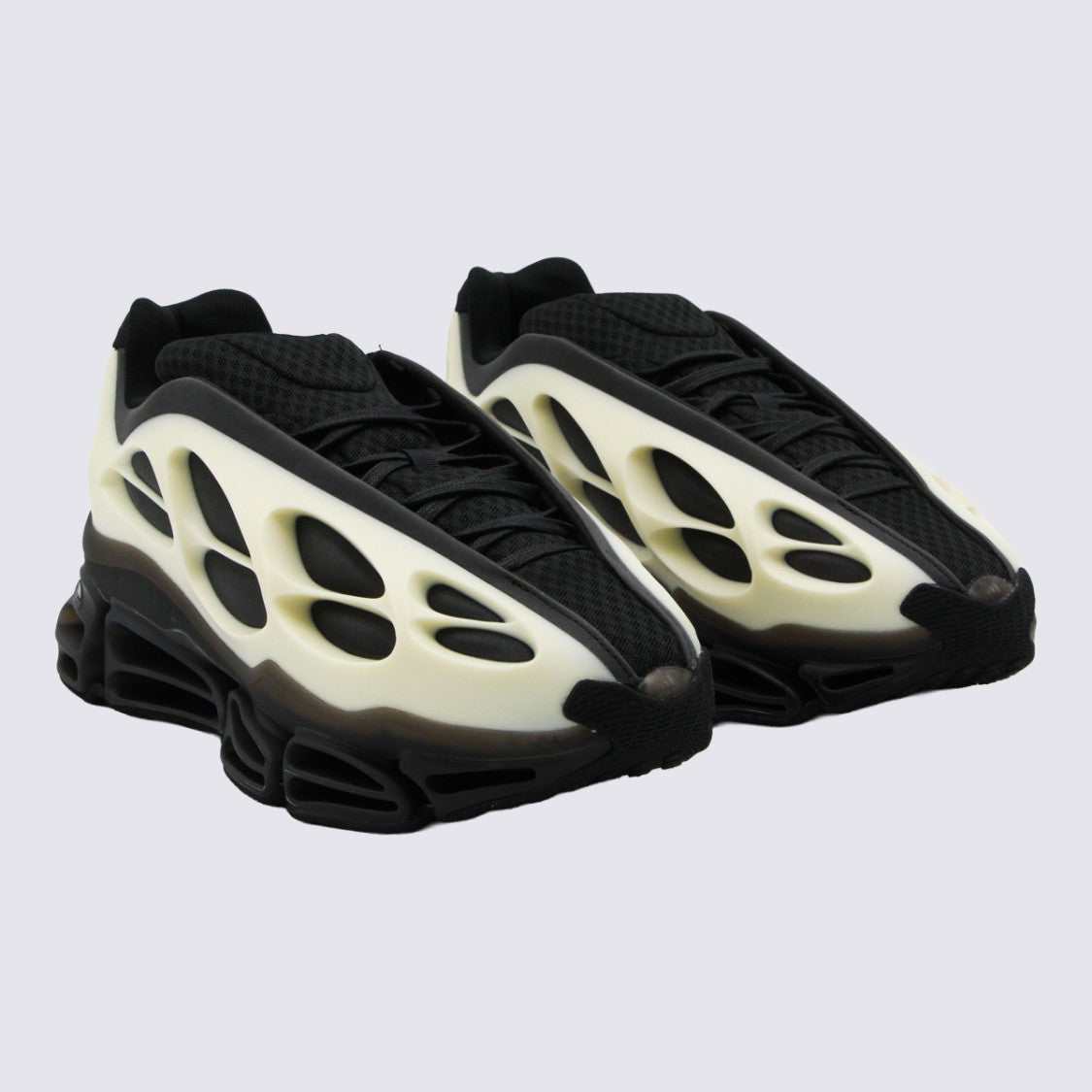 Adidas X Willy Chavarria Futuristic Sneakers With Sculpted Cage Overlay