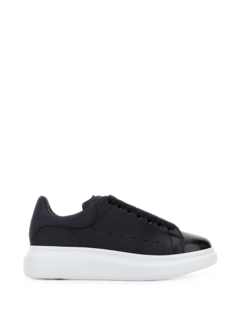 Alexander Mcqueen Black Sleek Leather Modern Sneakers