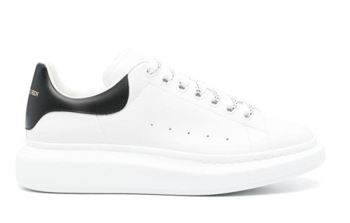 Alexander Mcqueen Minimalist White Leather Sneakers With Contrasting Heel Tab