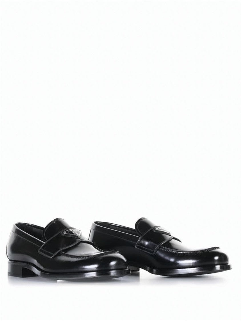 Prada Polished Black Leather Loafers With Minimalist Design