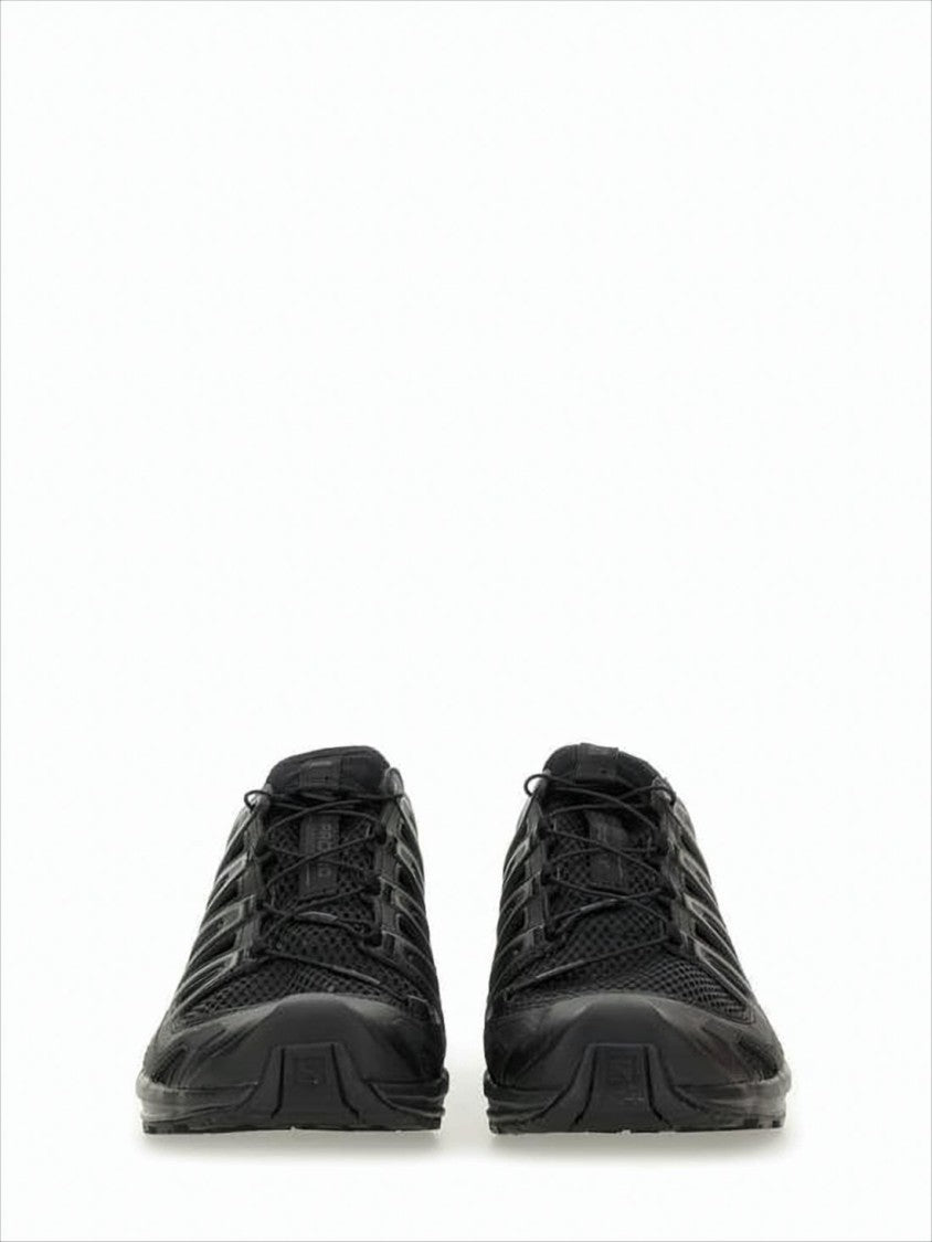 Salomon All-Black Athletic Sneakers With Quick-Pull Lacing System