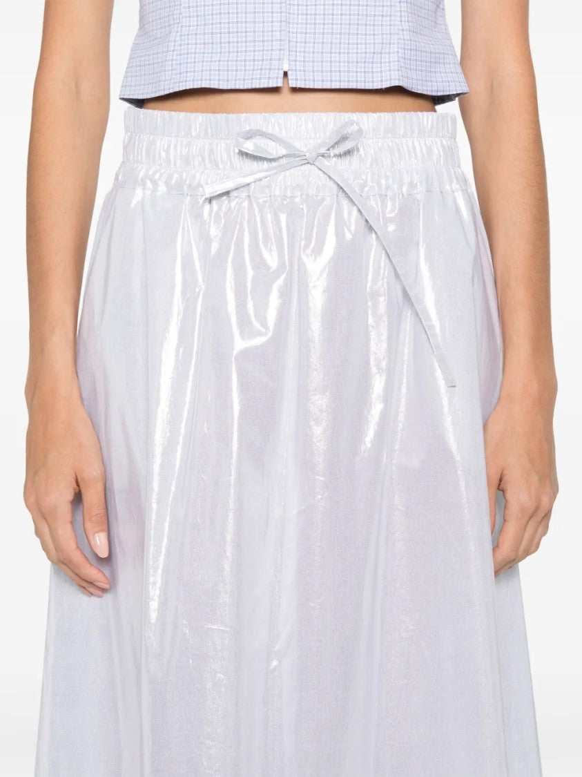 D. Exterior Smooth Silhouette Subtle Texture Skirt