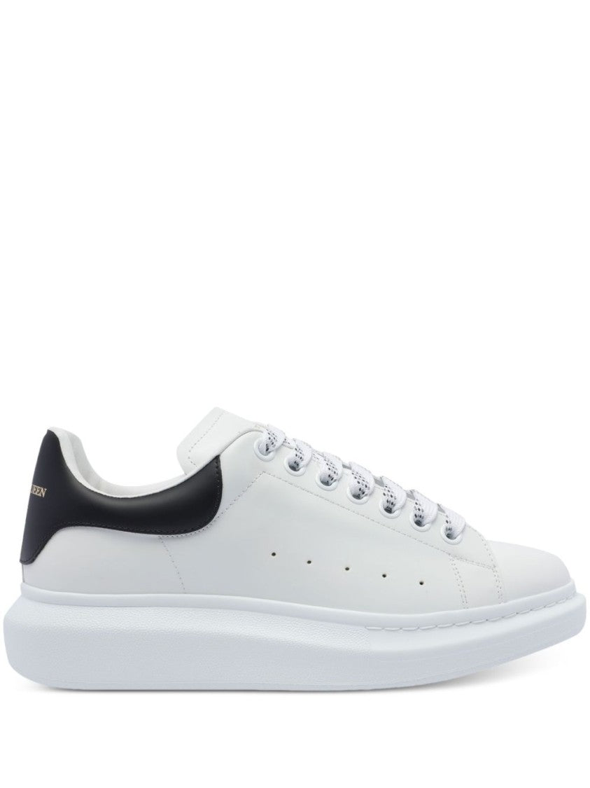 Alexander Mcqueen Minimalist White Leather Sneakers With Contrasting Heel Tab