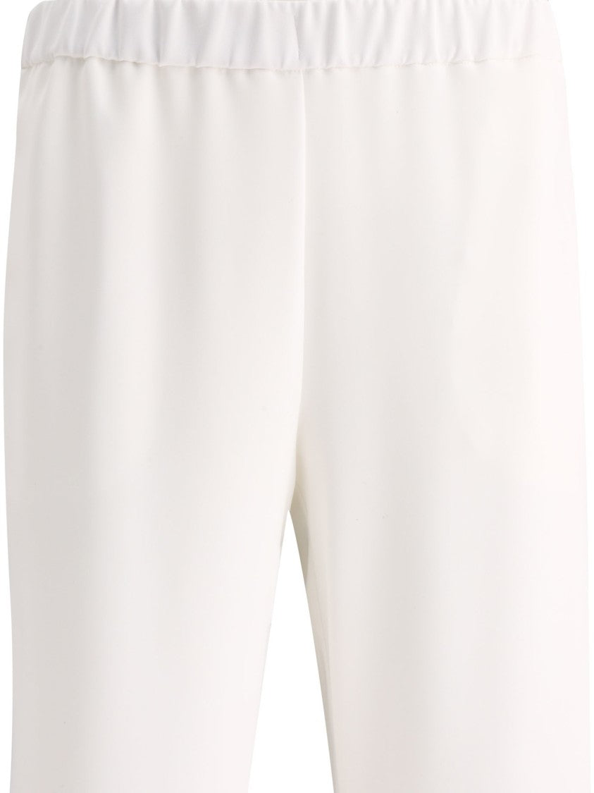 F.It Relaxed Fit White Trousers With Minimalist Aesthetic