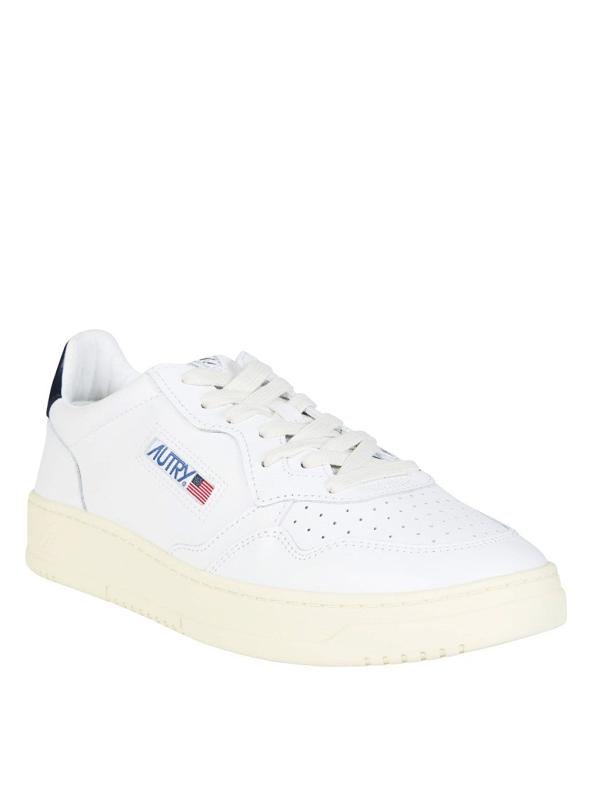 Autry White Medalist Low Navy Heel Sneakers