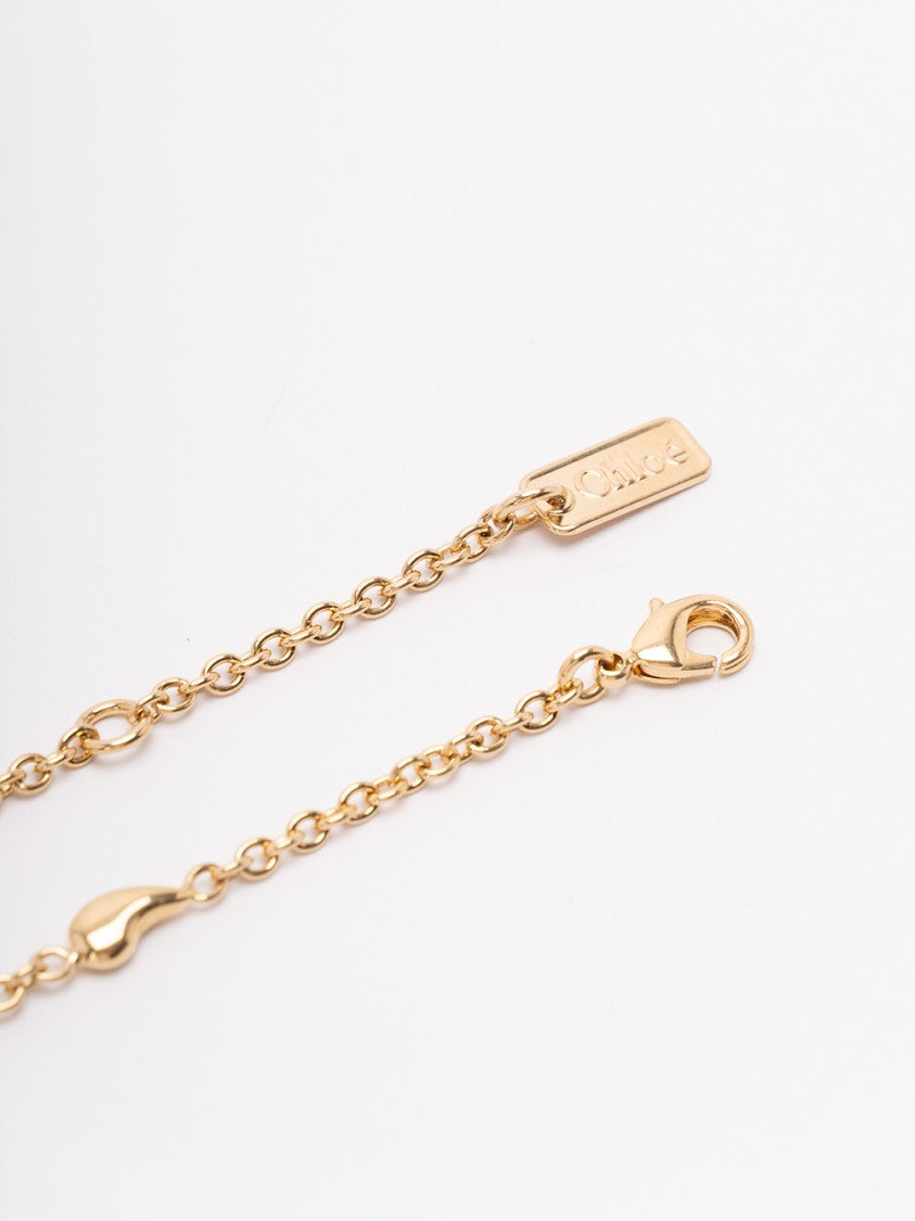 Chloé Polished Brass Bracelet With Timeless Design