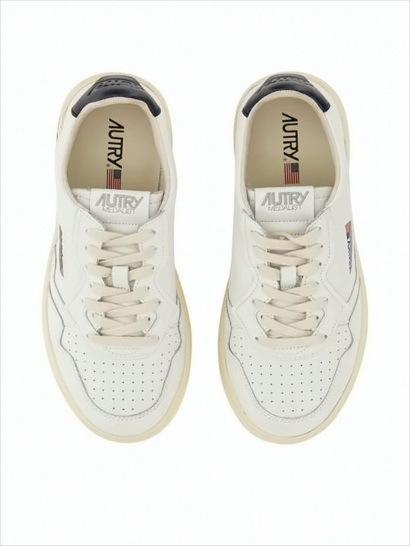 Autry Low-Top Sneakers With Perforated Detailing And Vintage Aesthetics