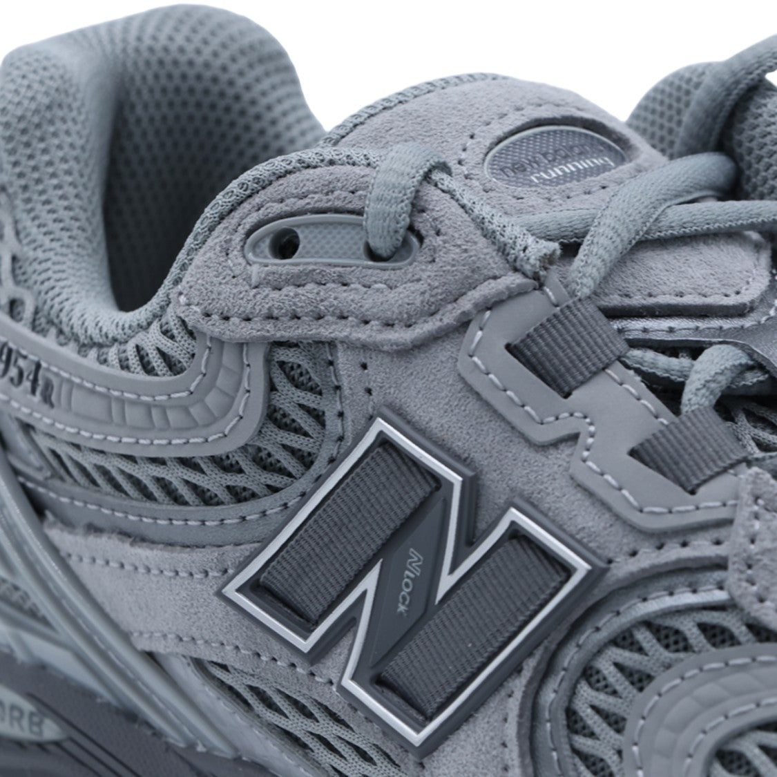 New Balance Layered Grey Sneakers With Cushioned Sole And Iconic Logo