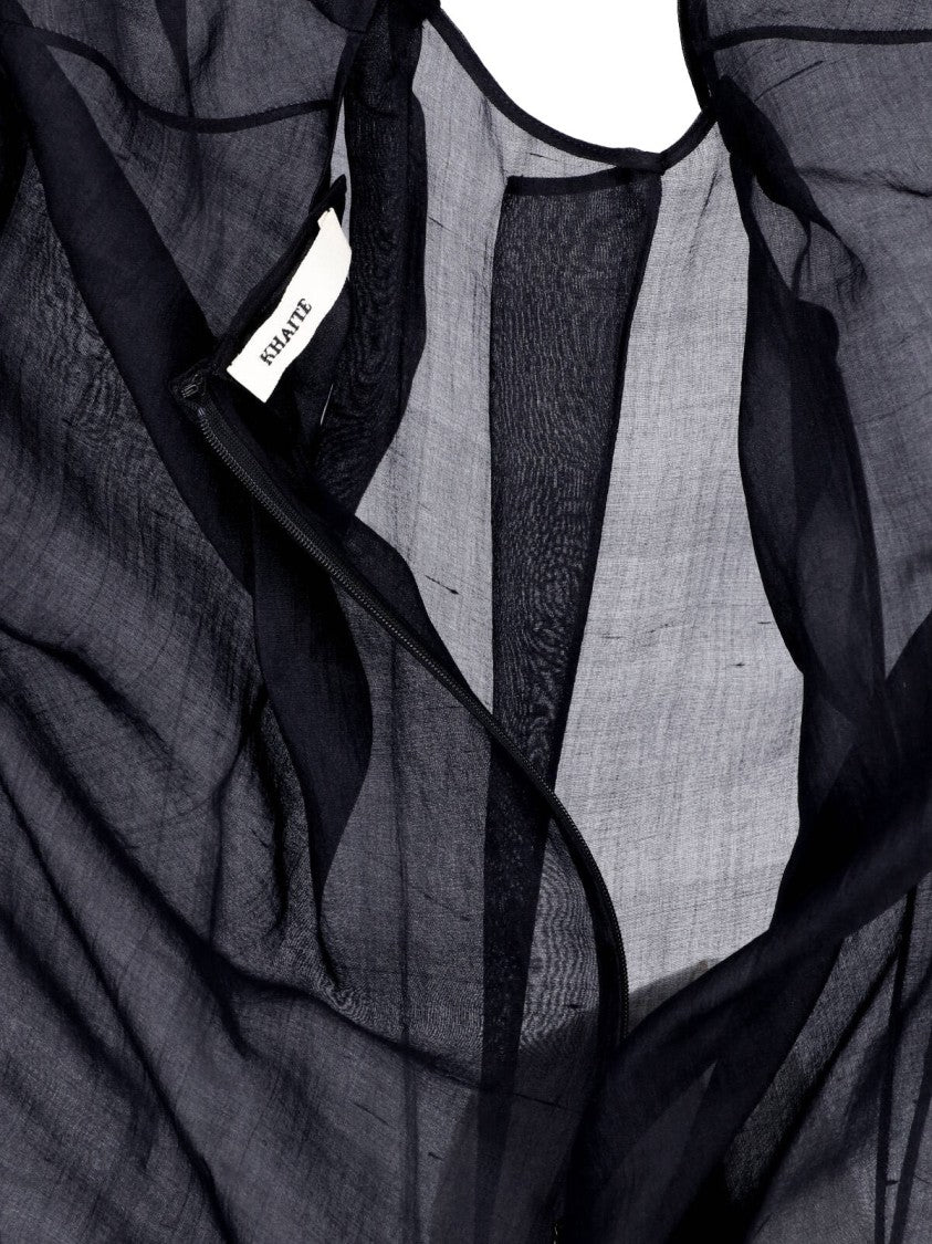 Khaite Semi-Transparent Black Top With Asymmetrical Peplum Hem