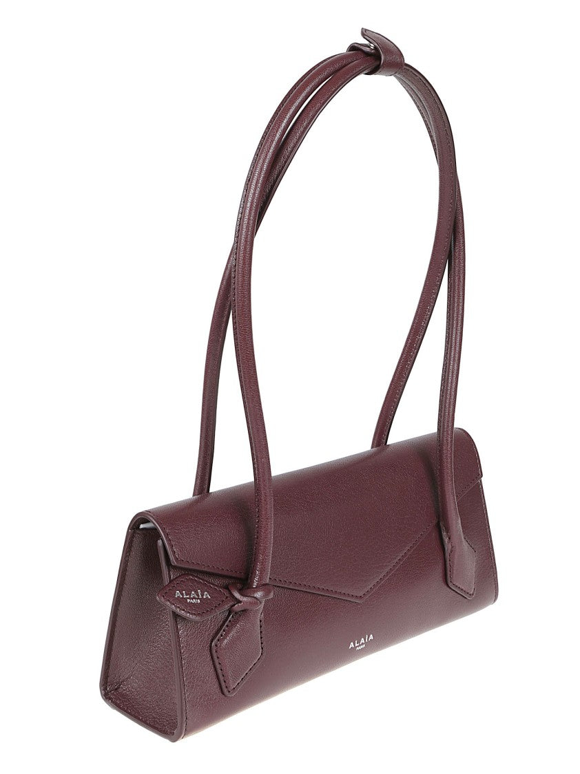 Alaïa Burgundy Smooth Leather Bag With Structured Flap Closure
