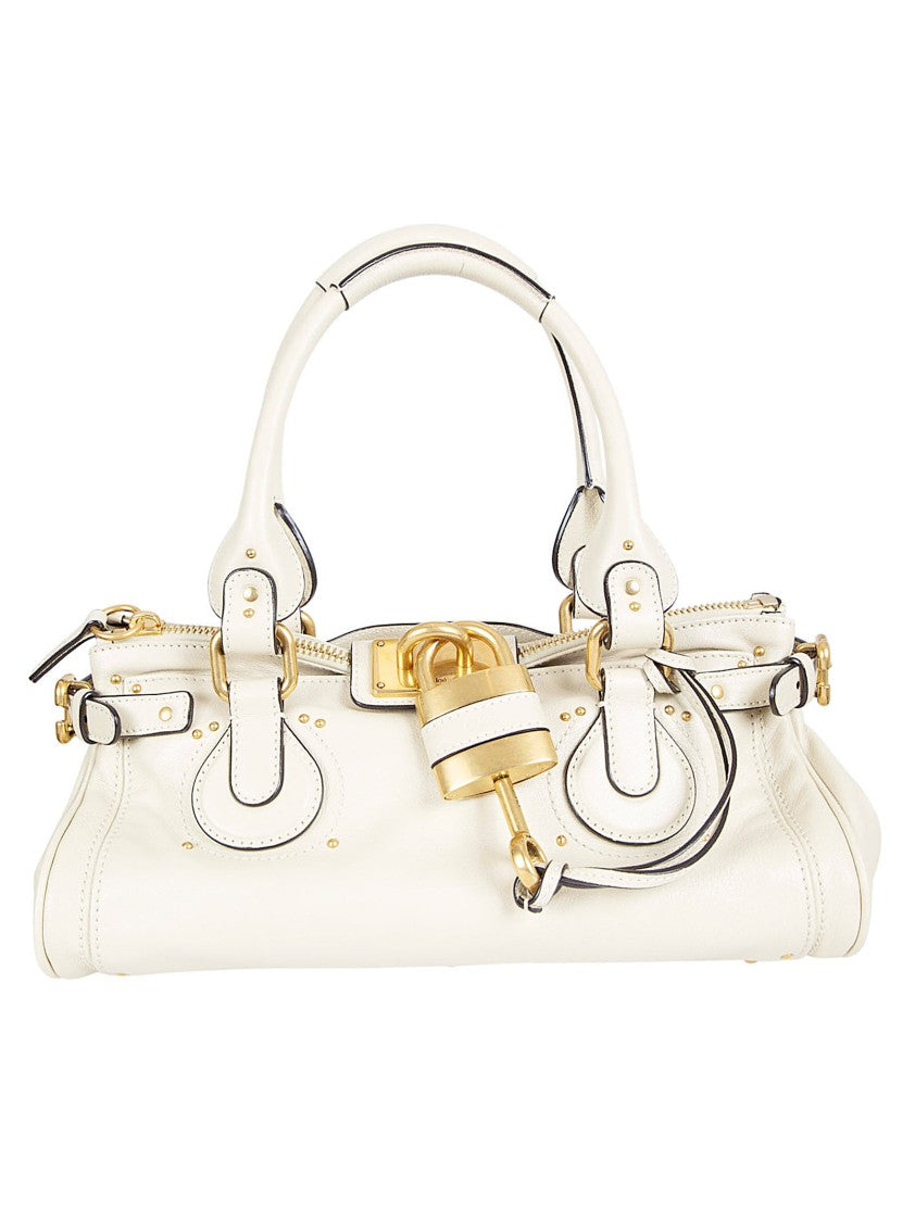 Chloé Structured White Leather Handbag With Golden Accents And Versatile Carry Options