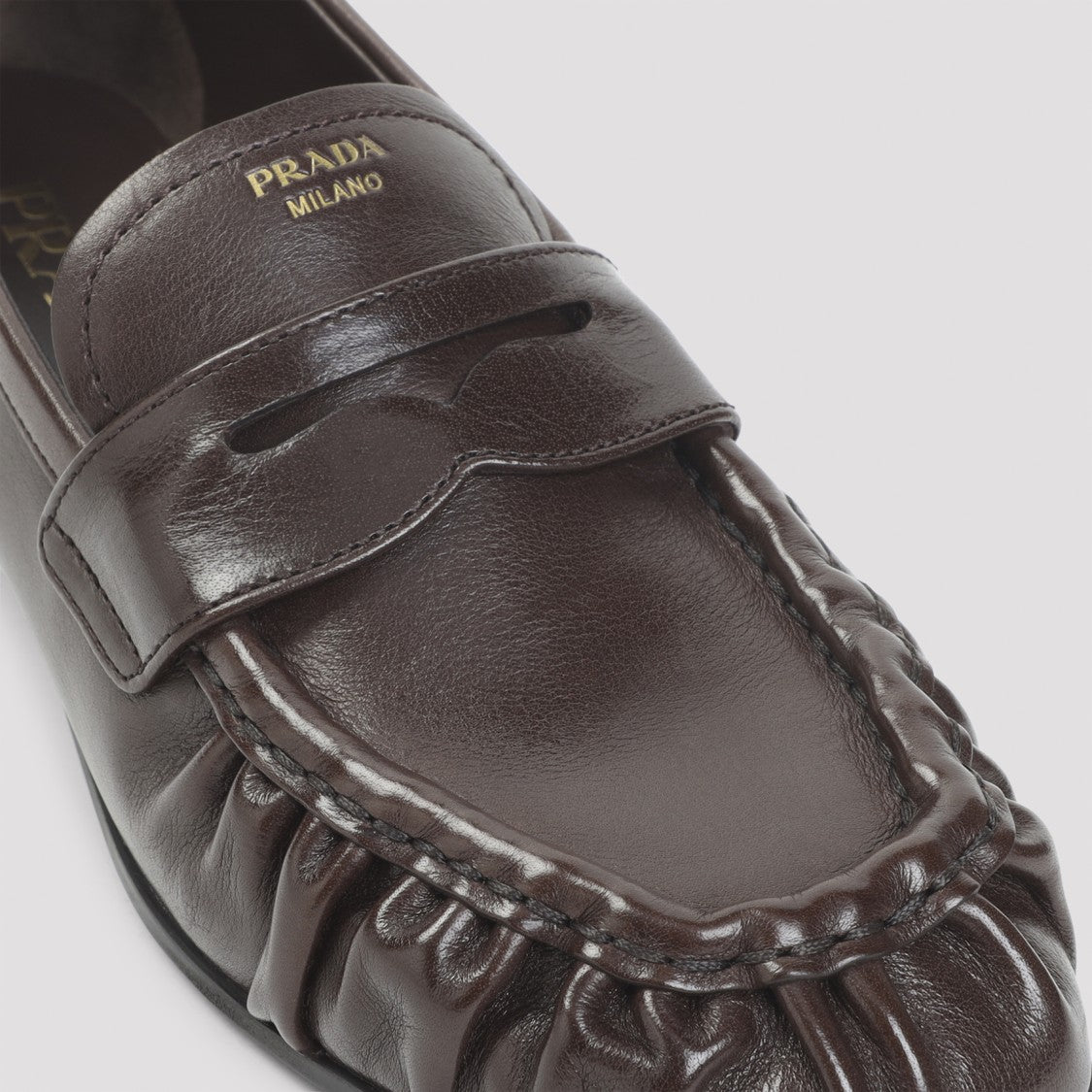Prada Brown Buffalo Leather Loafers With Gold-Toned Logo
