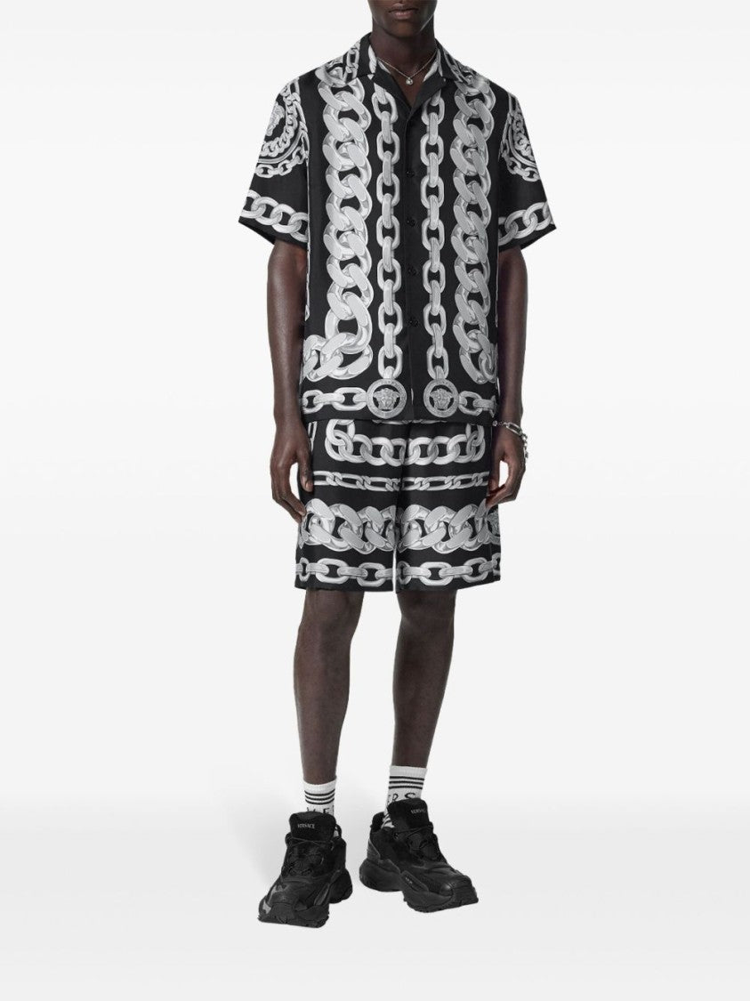 Versace Knee-Length Activewear Shorts With Bold Chain Graphic