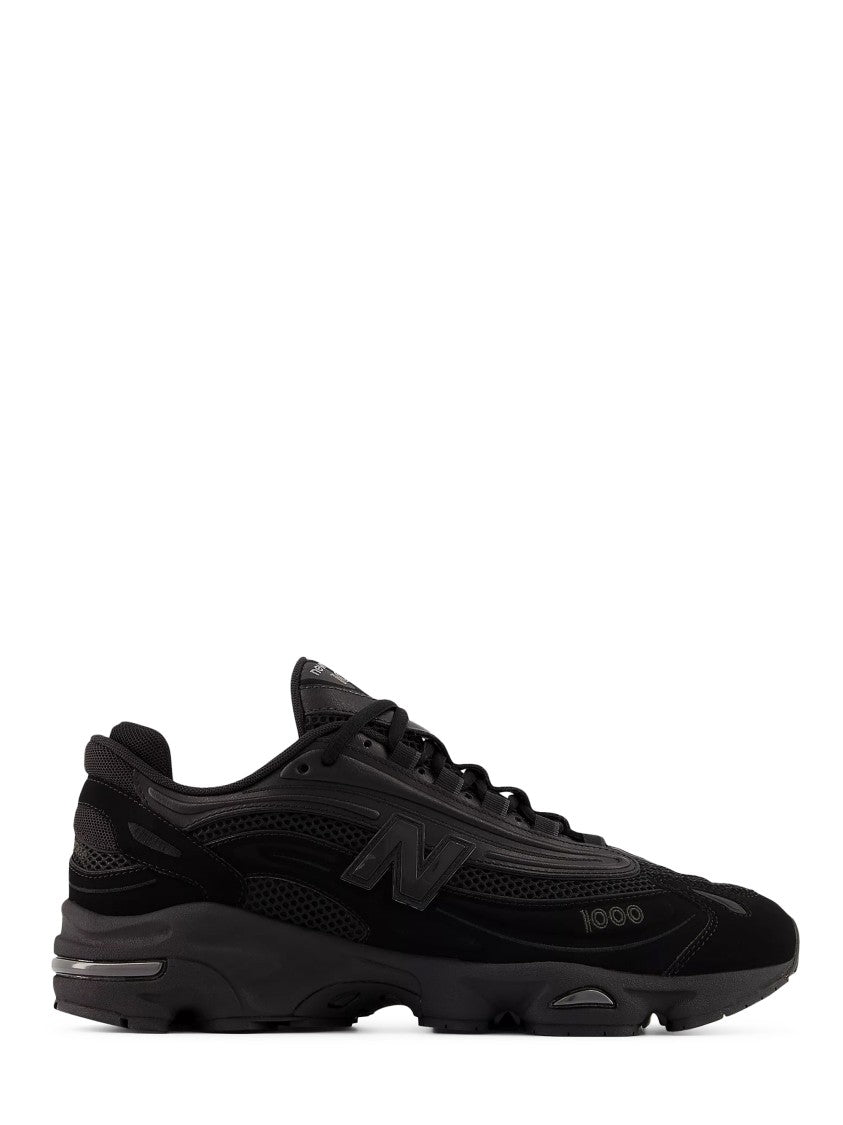 New Balance Streamlined All-Black Sneakers With Cushioned Sole