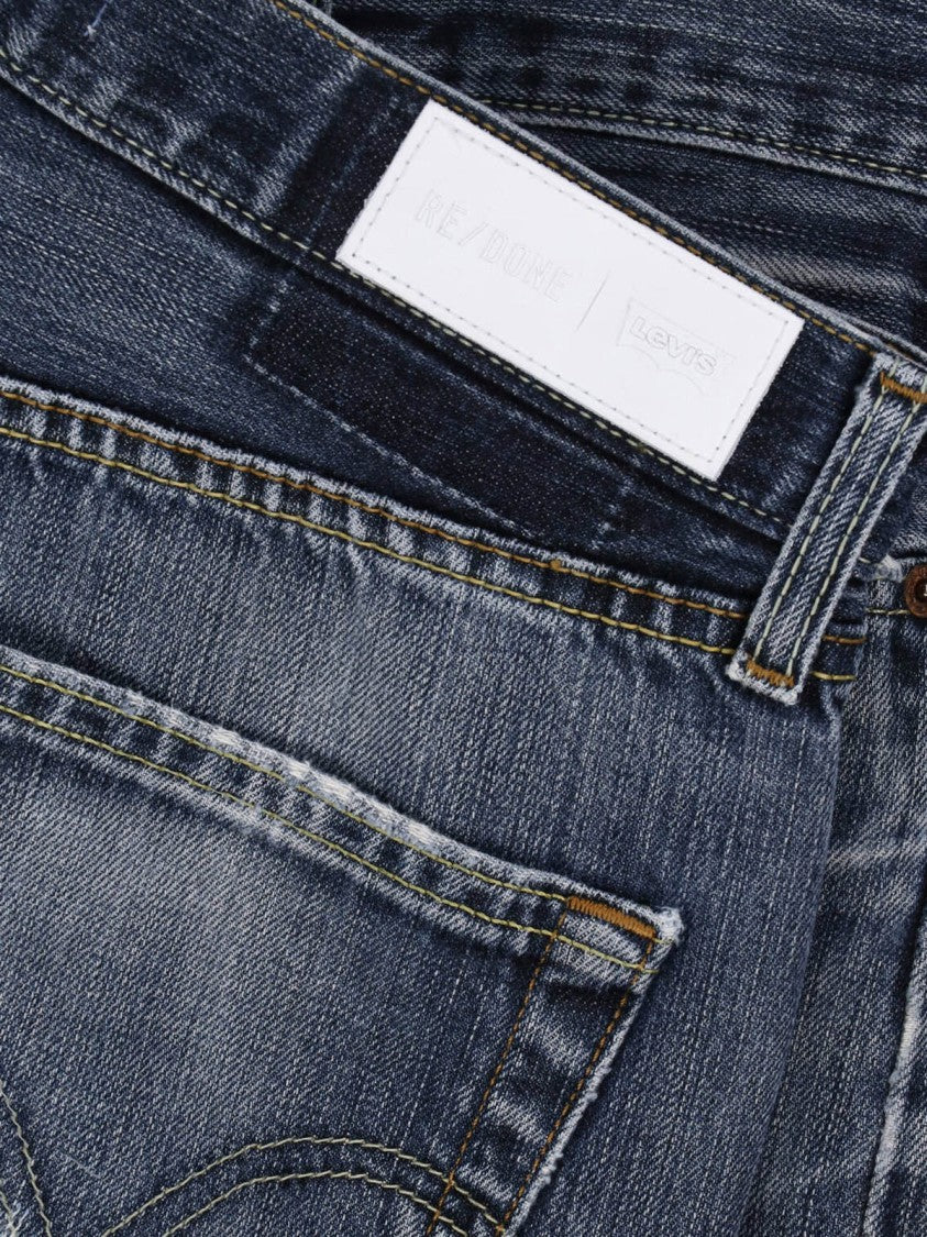 Re/Done Blue Mid-Rise Distressed Frayed Denim Shorts