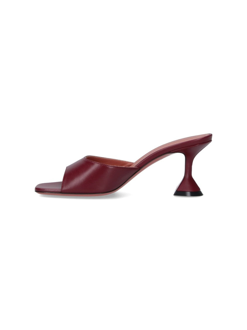 Amina Muaddi Sleek Pumps With Bold Red Heel And Contemporary Design