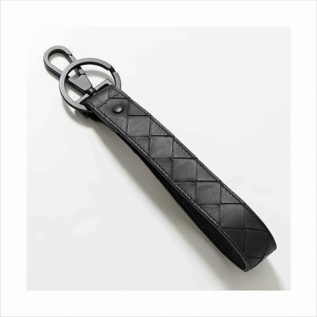 Bottega Veneta Minimalist Black Leather Keyring With Woven Design