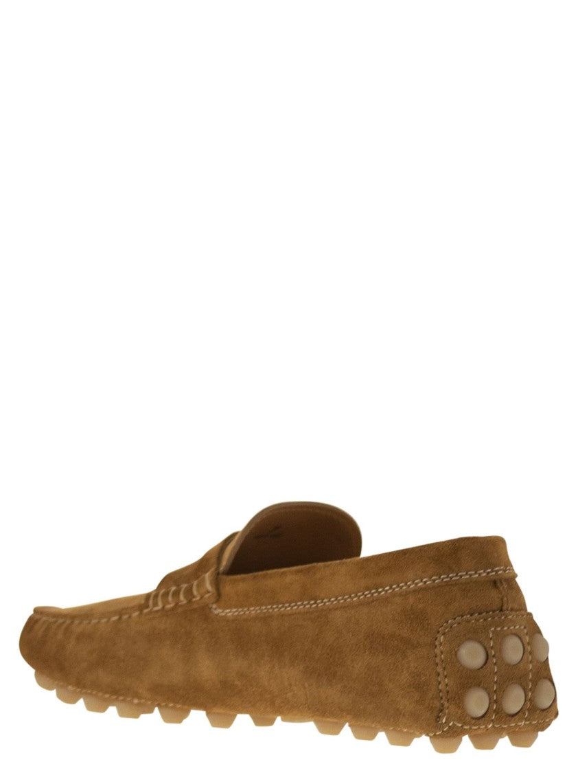 Tod's Contemporary Suede Gommino Moccasin With Embossed Monogram