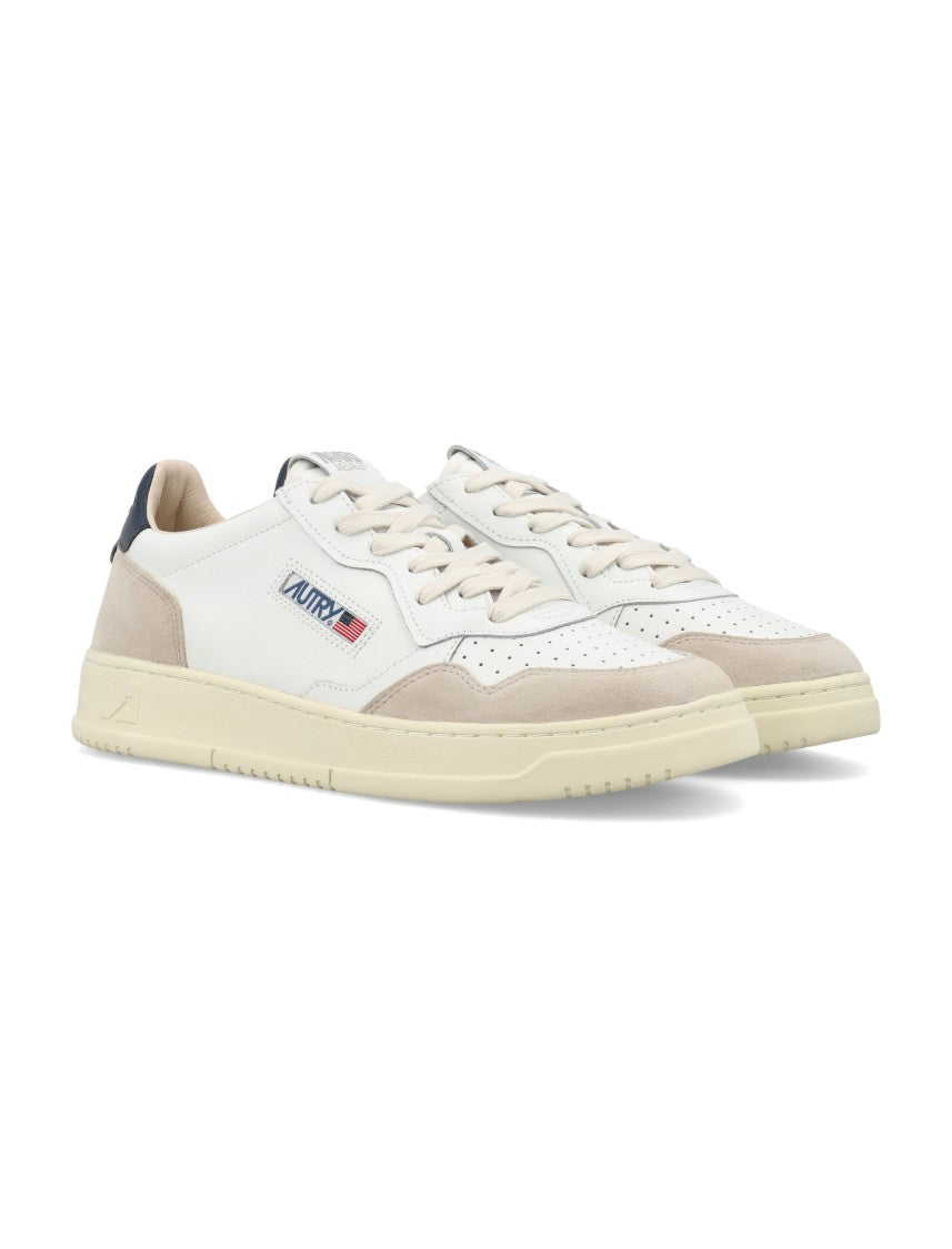 Autry Contemporary Tennis Sneakers With Suede Overlays And Contrasting Detail