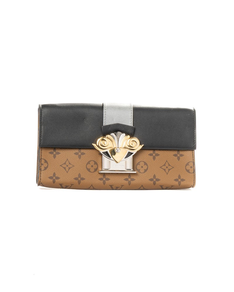 Louis Vuitton Monogram Reverse Canvas Clutch With Adjustable Strap
