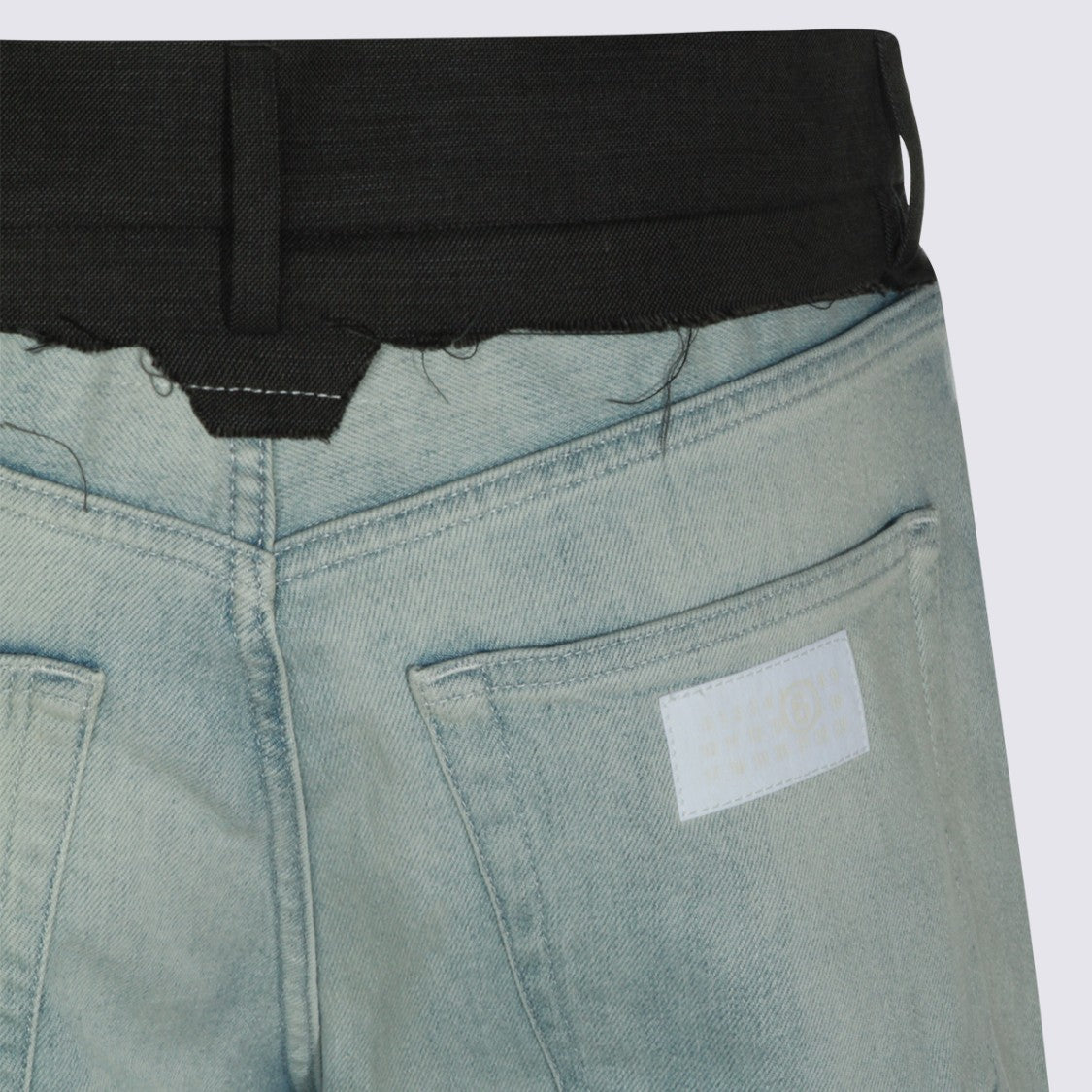 Mm6 By Maison Margiela Light Blue Washed Denim Jeans With Black Waistband And Raw Edge