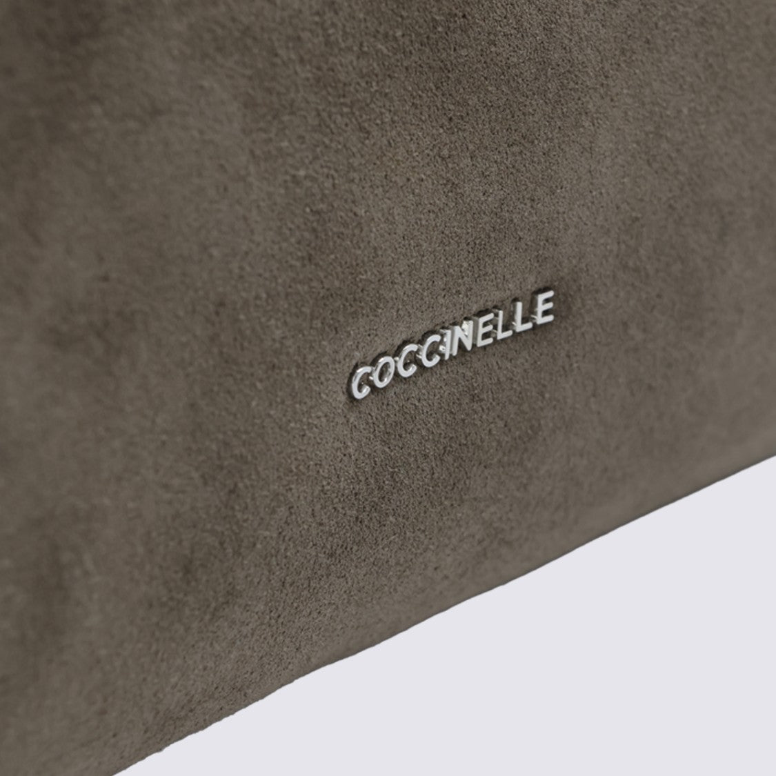 Coccinelle Structured Handbag With Braided Handle And Minimalist Design