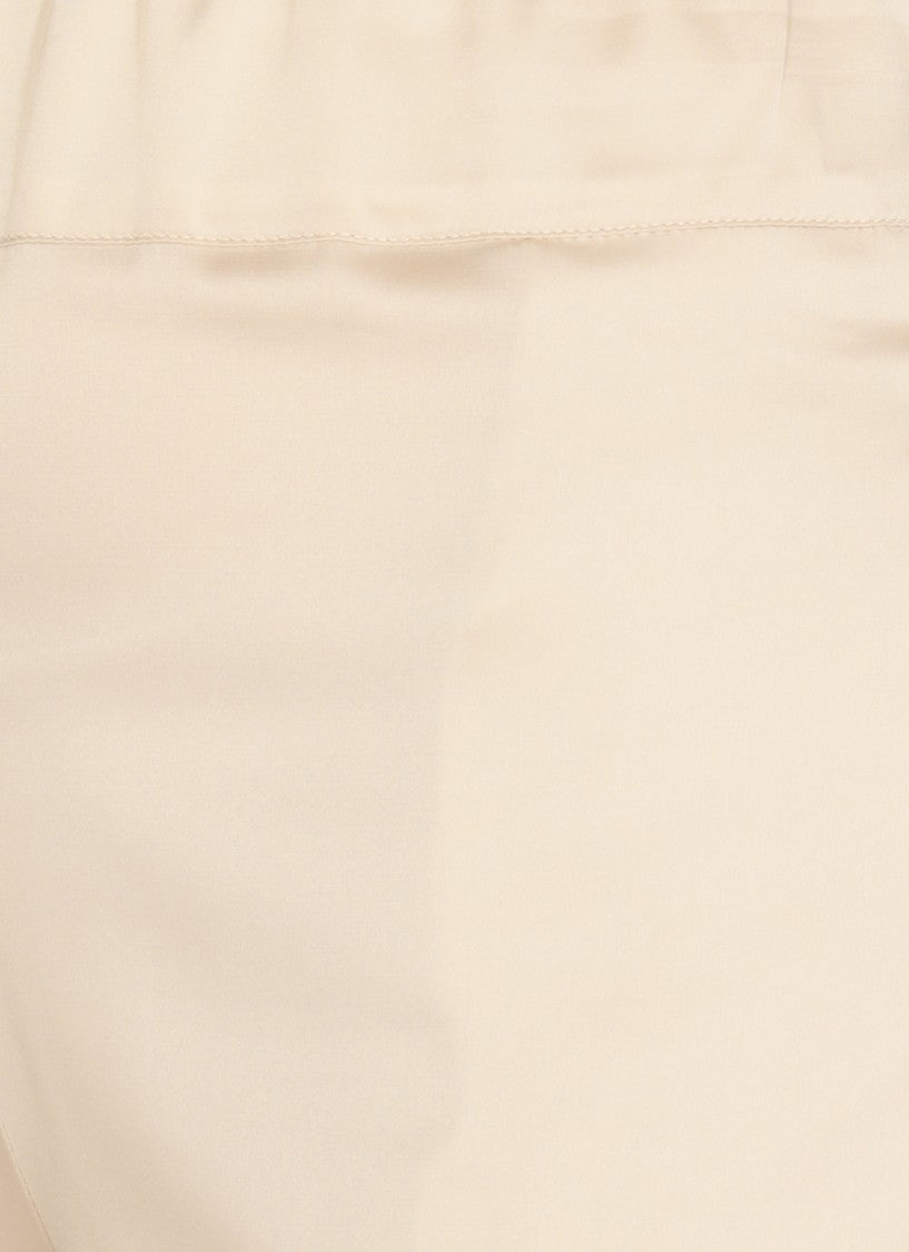 D. Exterior Beige Satin Pants