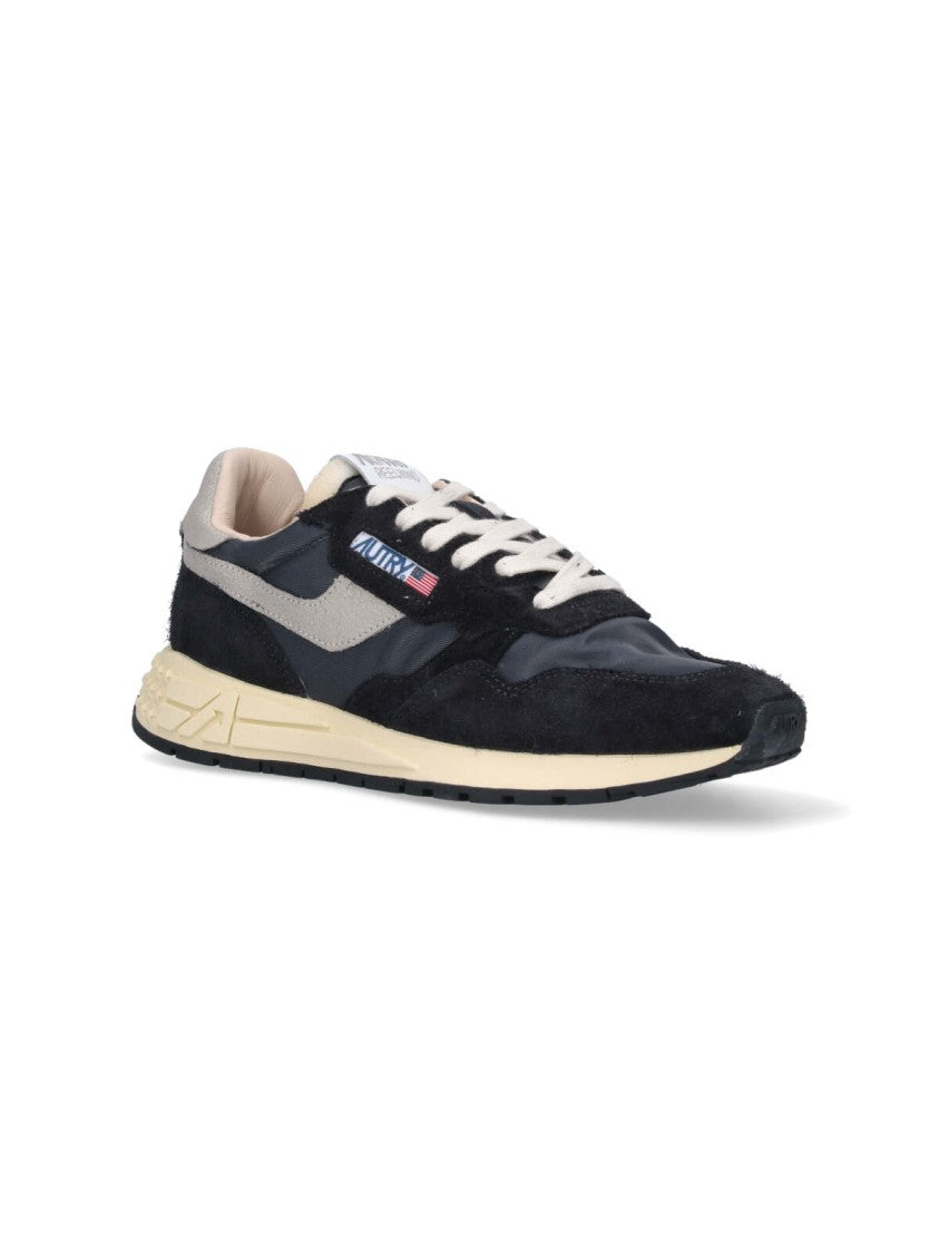 Autry Streamlined Black Sneakers With Minimalist Design