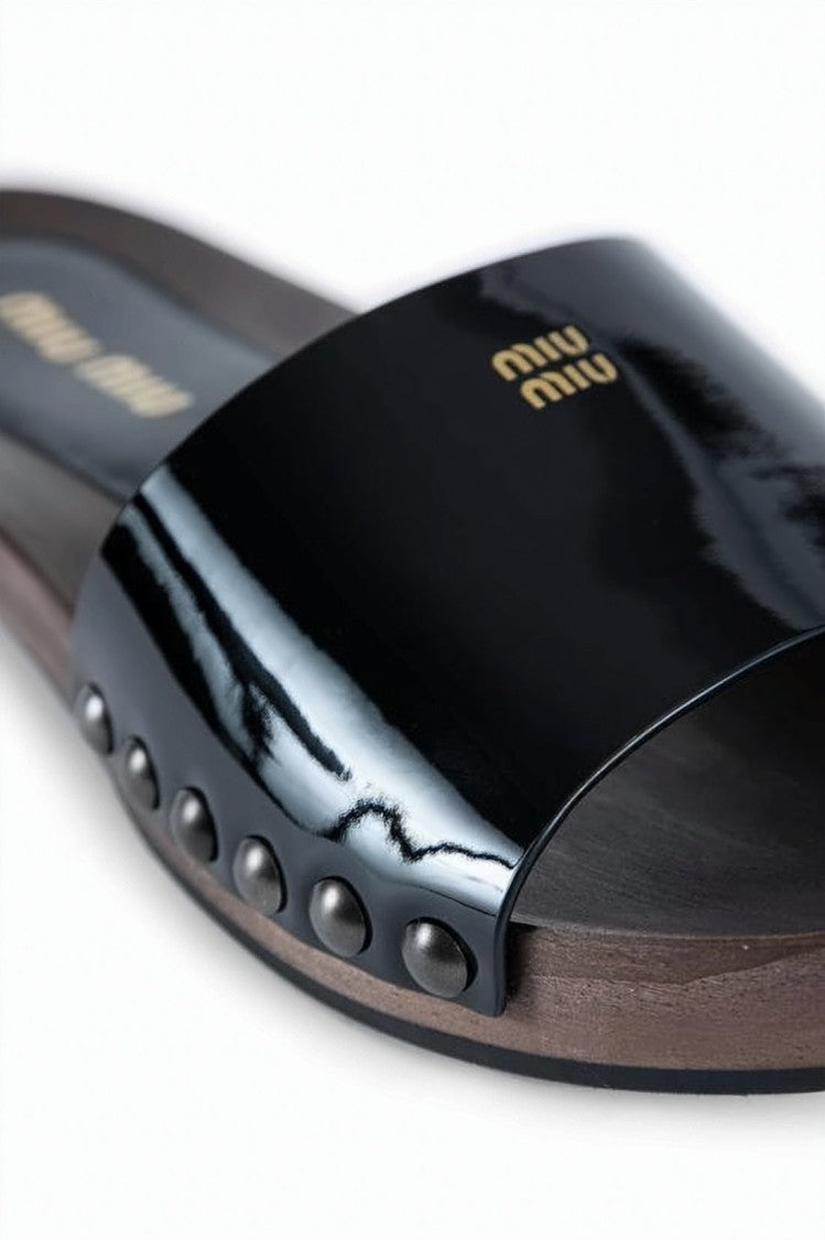 Miu Miu Patent Leather Slide Sandals With Studded Accents
