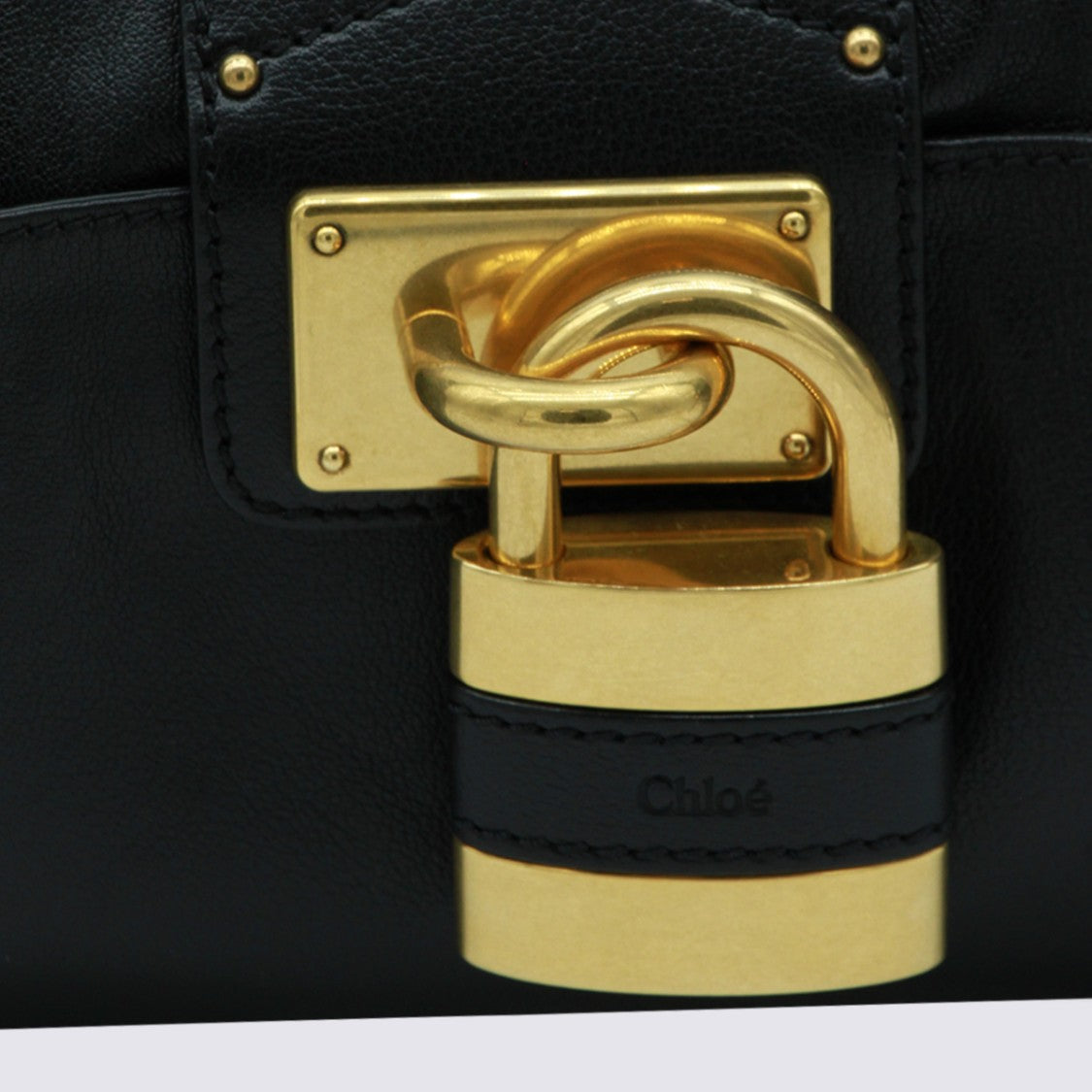 Chloé Sleek Structured Black Handbag With Gold Accents