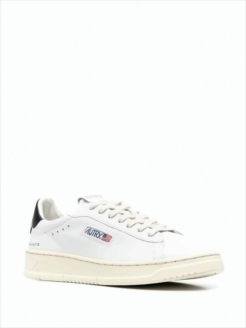 Autry Minimalist White Leather Low-Top Sneakers With Subtle Perforations