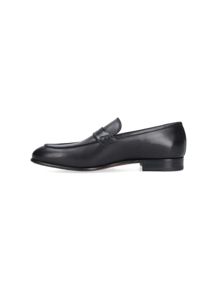 Ferragamo Black Round Toe Smooth Leather Loafers