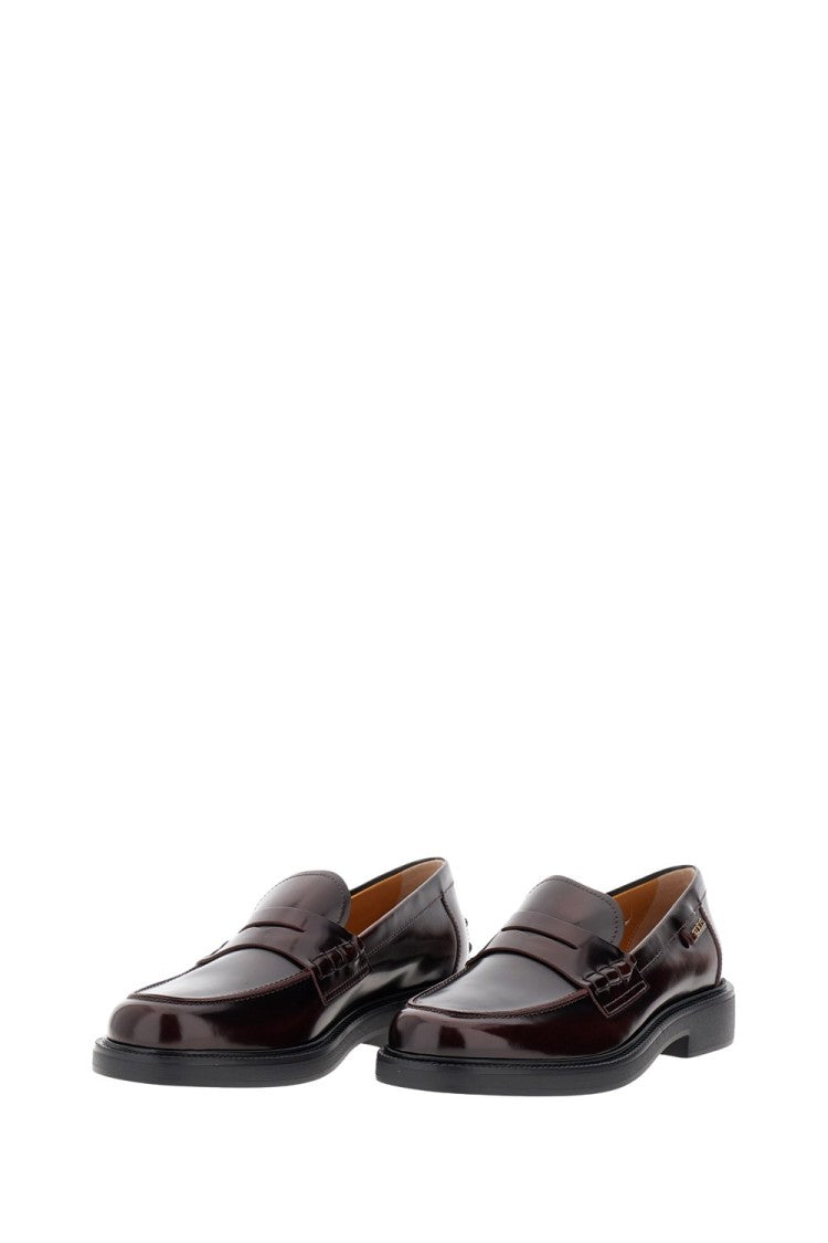 Tod's Polished Leather Moccasin With Subtle Logo Detailing