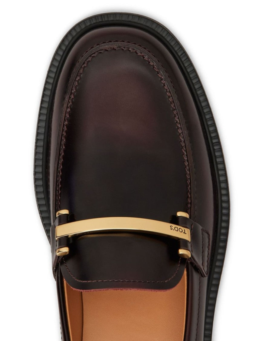 Tod's Polished Burgundy Loafers With Decorative Metal Bar