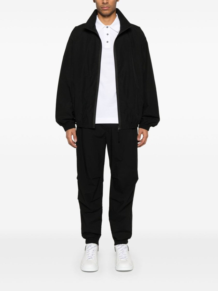 Dolce & Gabbana Black Tapered Trousers With Concealed Fastening