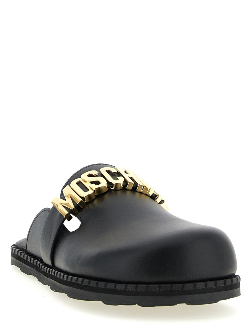 Moschino Closed-Toe Leather Sabots With Metal Logo Strap