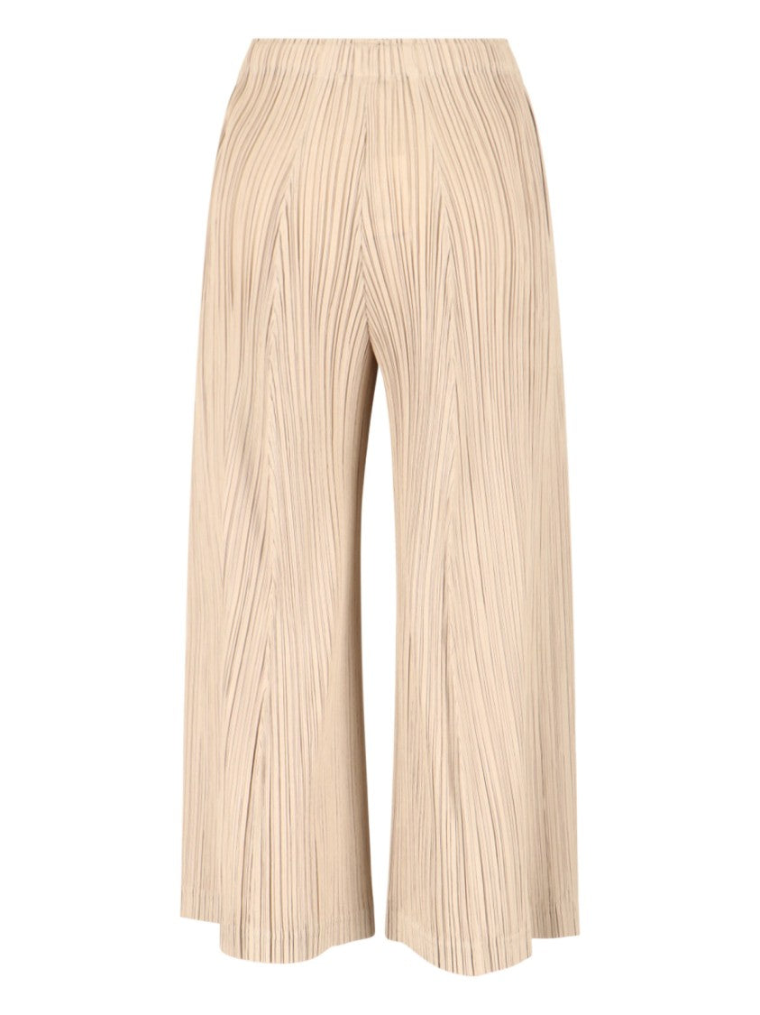 Pleats Please Wide-Leg Cropped Trousers In Finely Pleated Fabric
