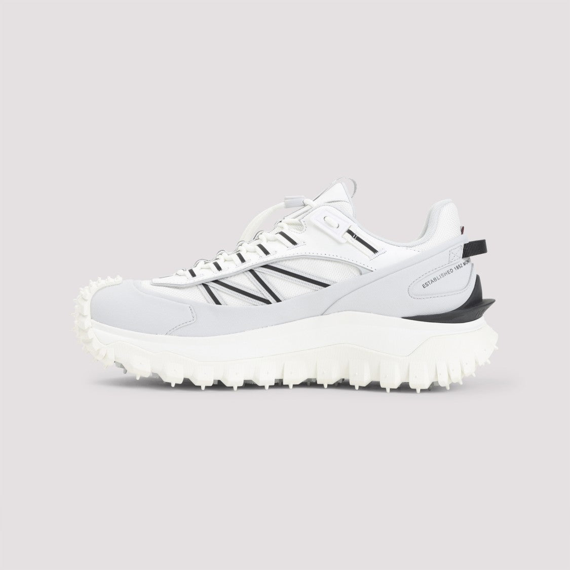 Moncler Chunky Leather Sneakers With Rugged Sole And Subtle Branding