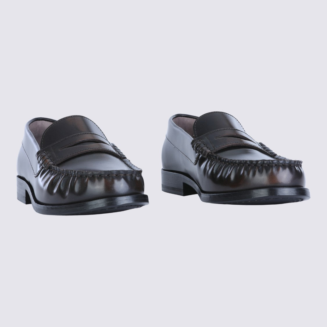 Alohas Timeless Black Leather Penny Loafers With Moccasin Stitching