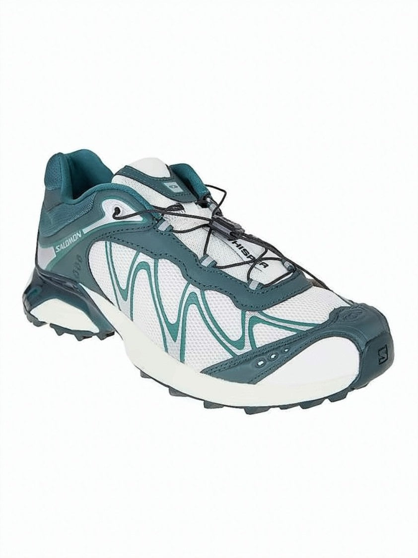 Salomon Low-Profile Sneakers With Teal Overlays And Rugged Sole
