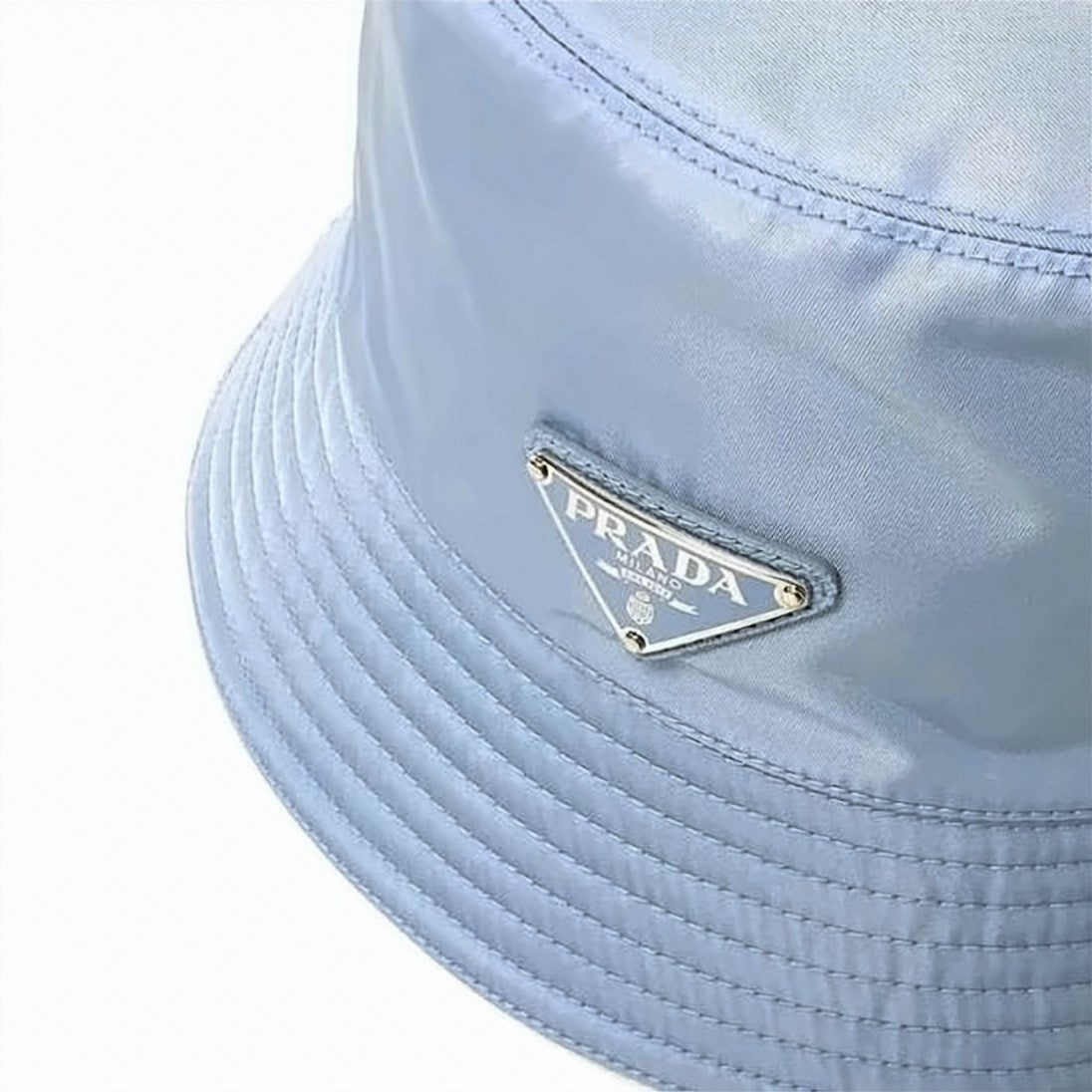 Prada Nylon Bucket Hat With Triangular Logo Plaque