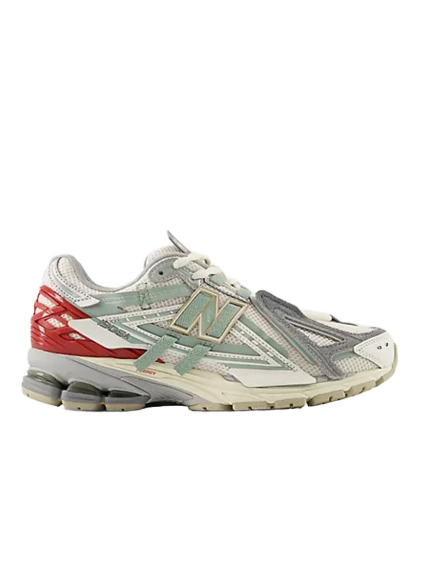 New Balance Layered Grey Sneakers With Chunky Sole And Iconic Branding