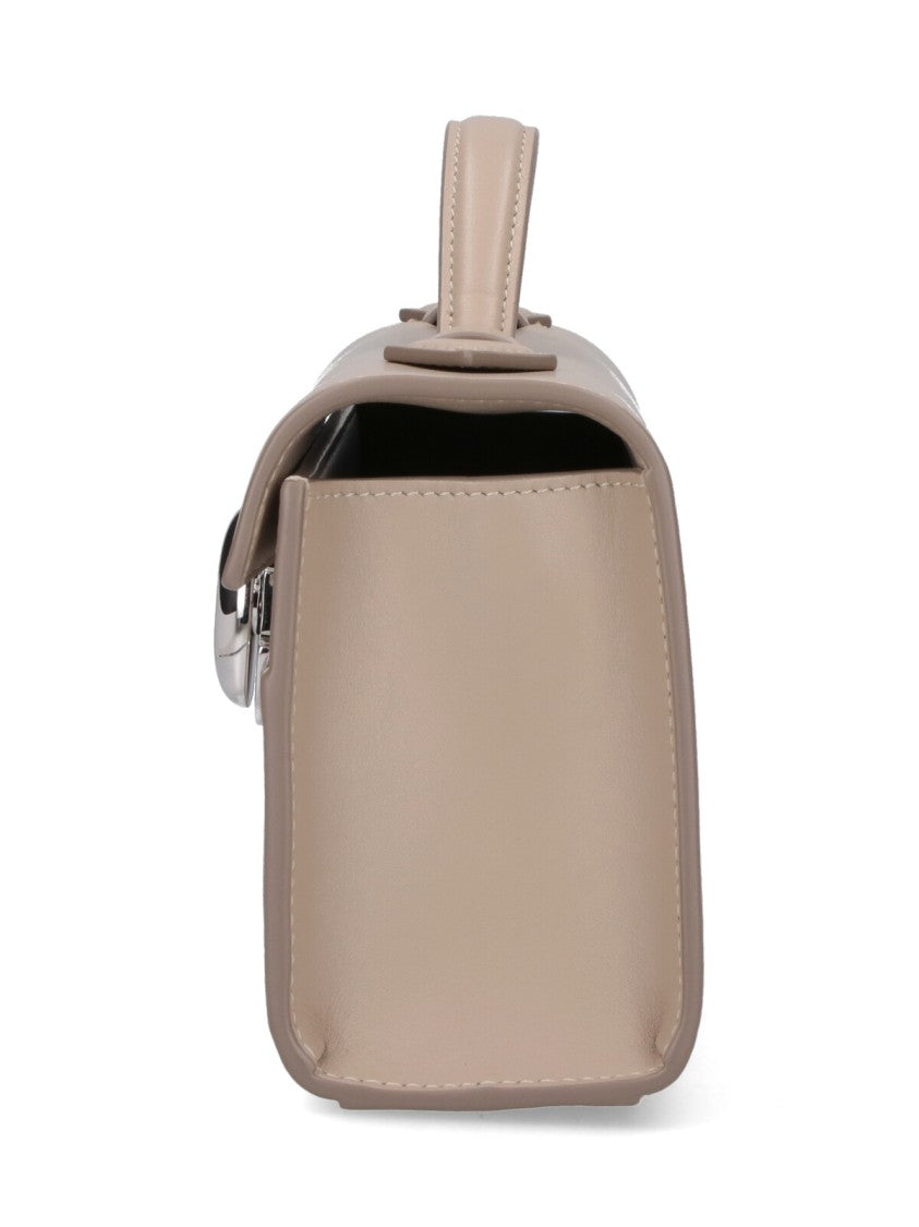 Savette Rectangular Beige Handbag With Silver Clasp Closure