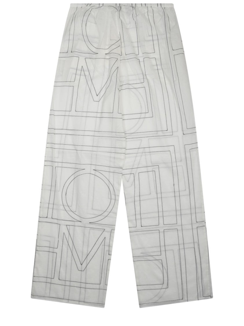 Totême Wide-Leg Pants With Subtle Monogram And Relaxed Fit
